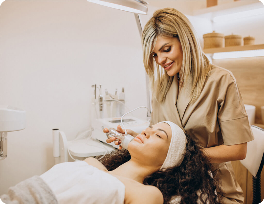 Woman receiving a professional care to improve skin texture and tone at Skin Luxe Medical Aesthetics in Salado