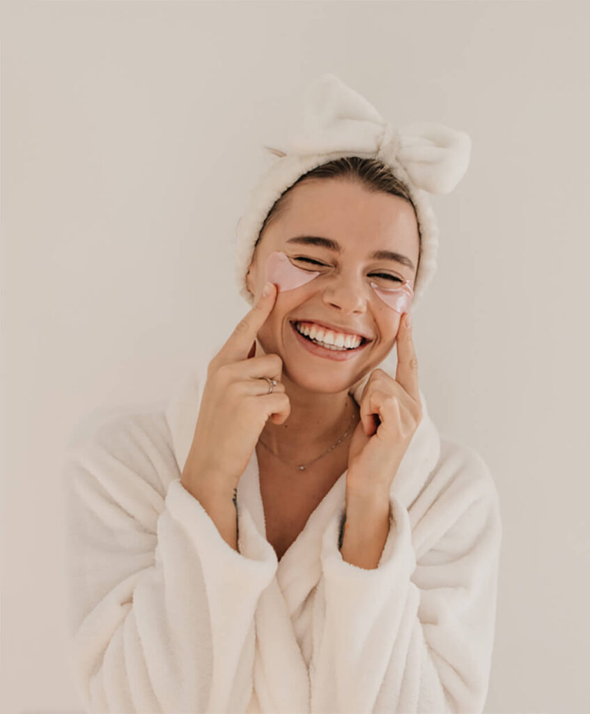 Smiling client receiving professional and compassionate care at Skin Luxe med spa